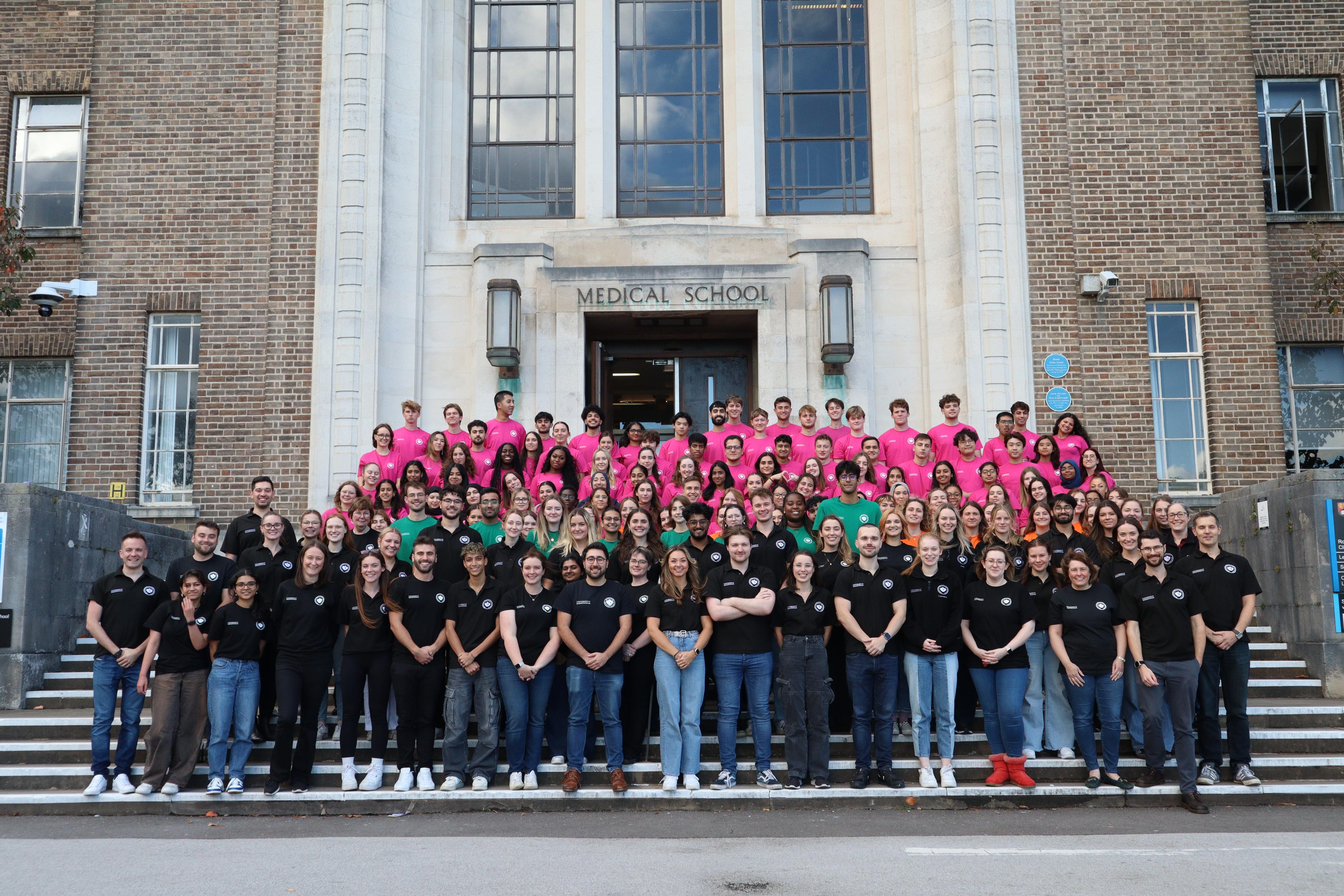 RMD Birmingham faculty and student team on the steps of the Medical School